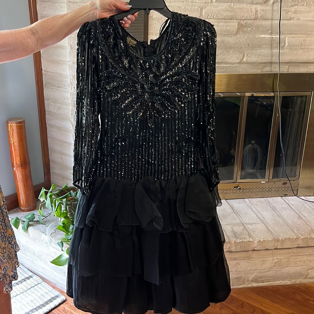 Black sparkly long sleeved ruffled dress